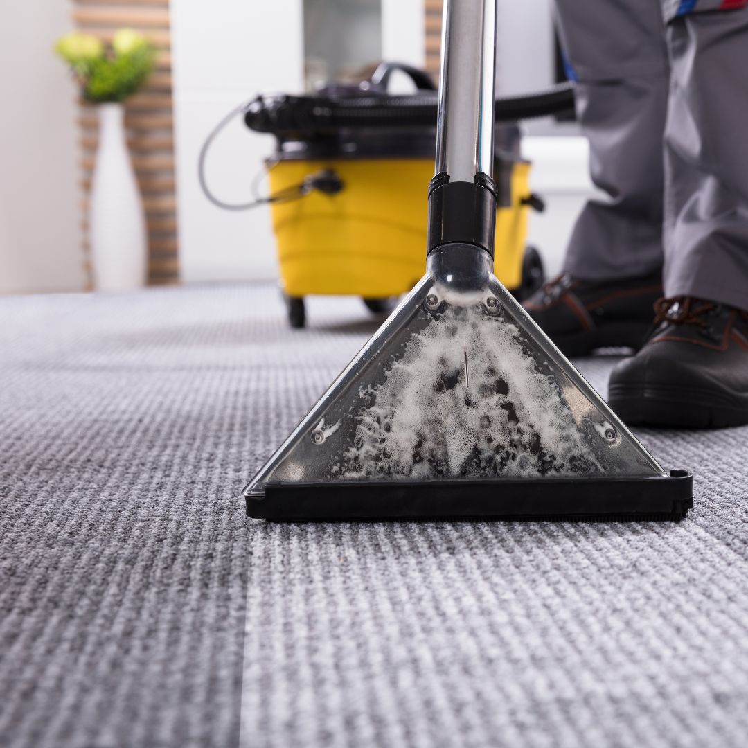 Ultra Cleaning technician deep extracting a commercial carpet in Malaysia