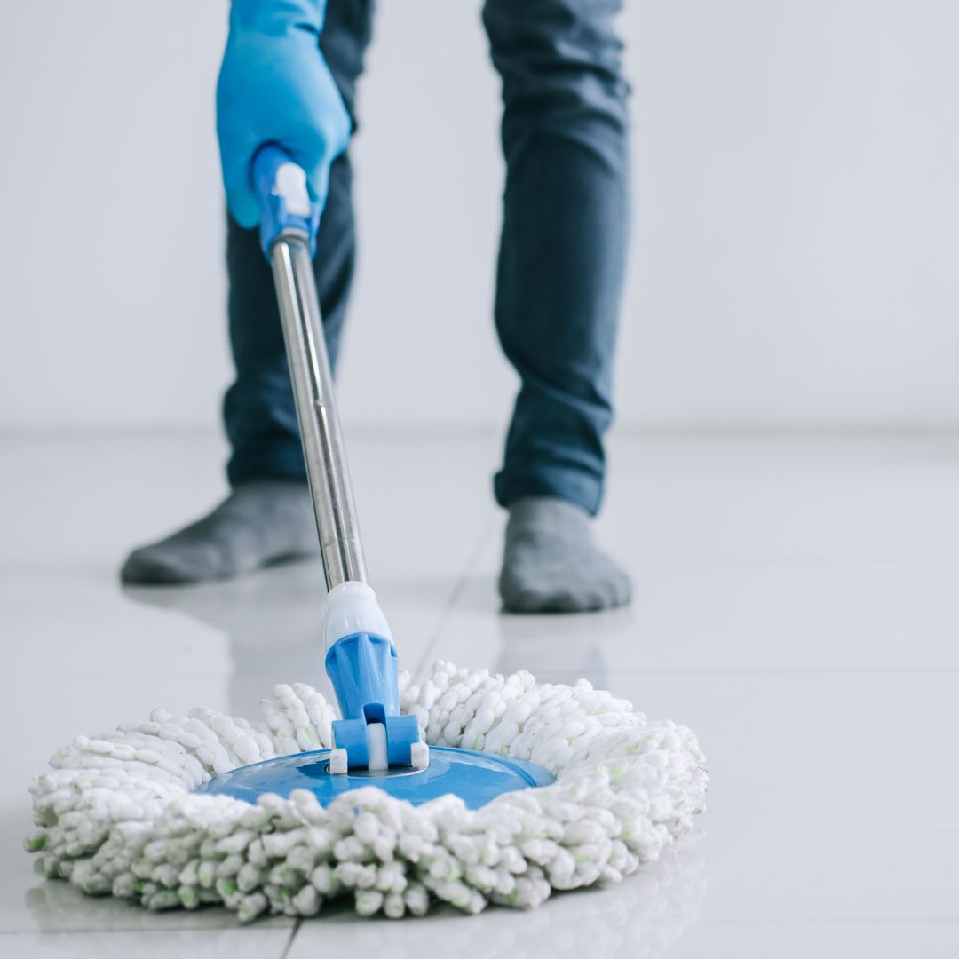 Hard surface floor being deep cleaned before polishing