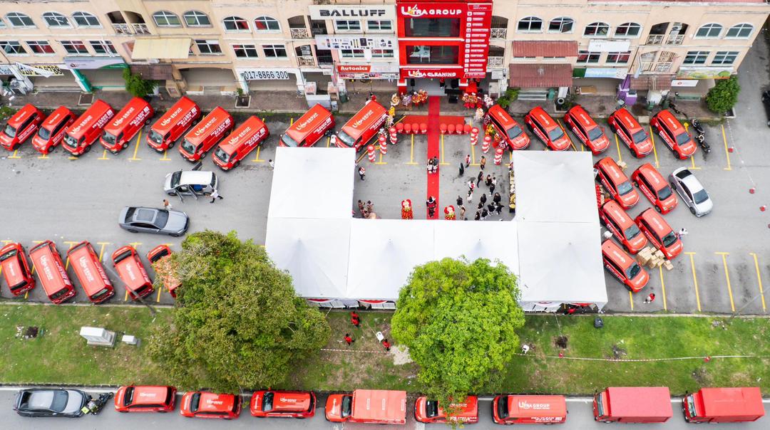 Aerial view of the Ultra Cleaning headquarters and service fleet