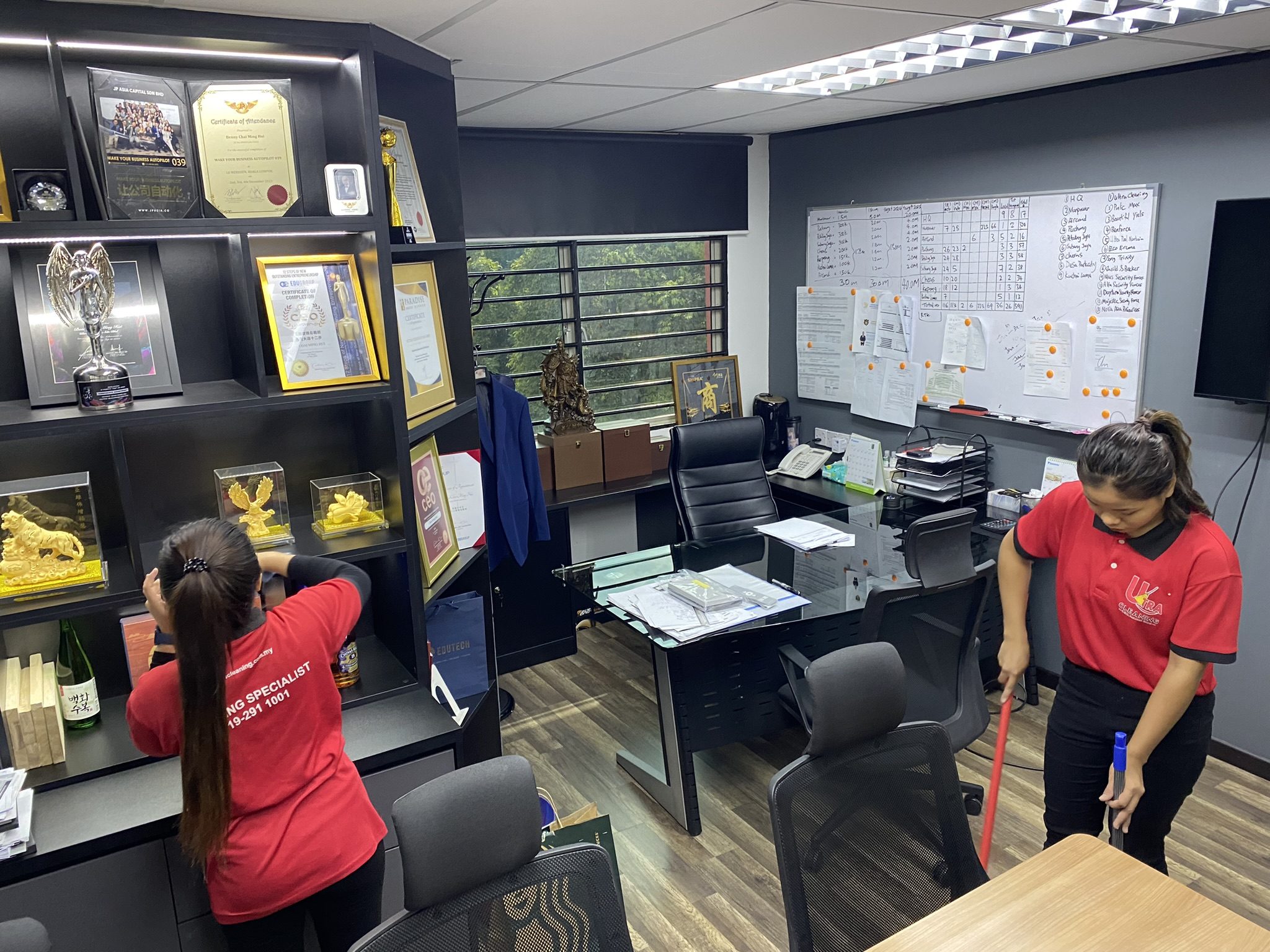 Ultra Cleaning specialist cleaning an office workspace